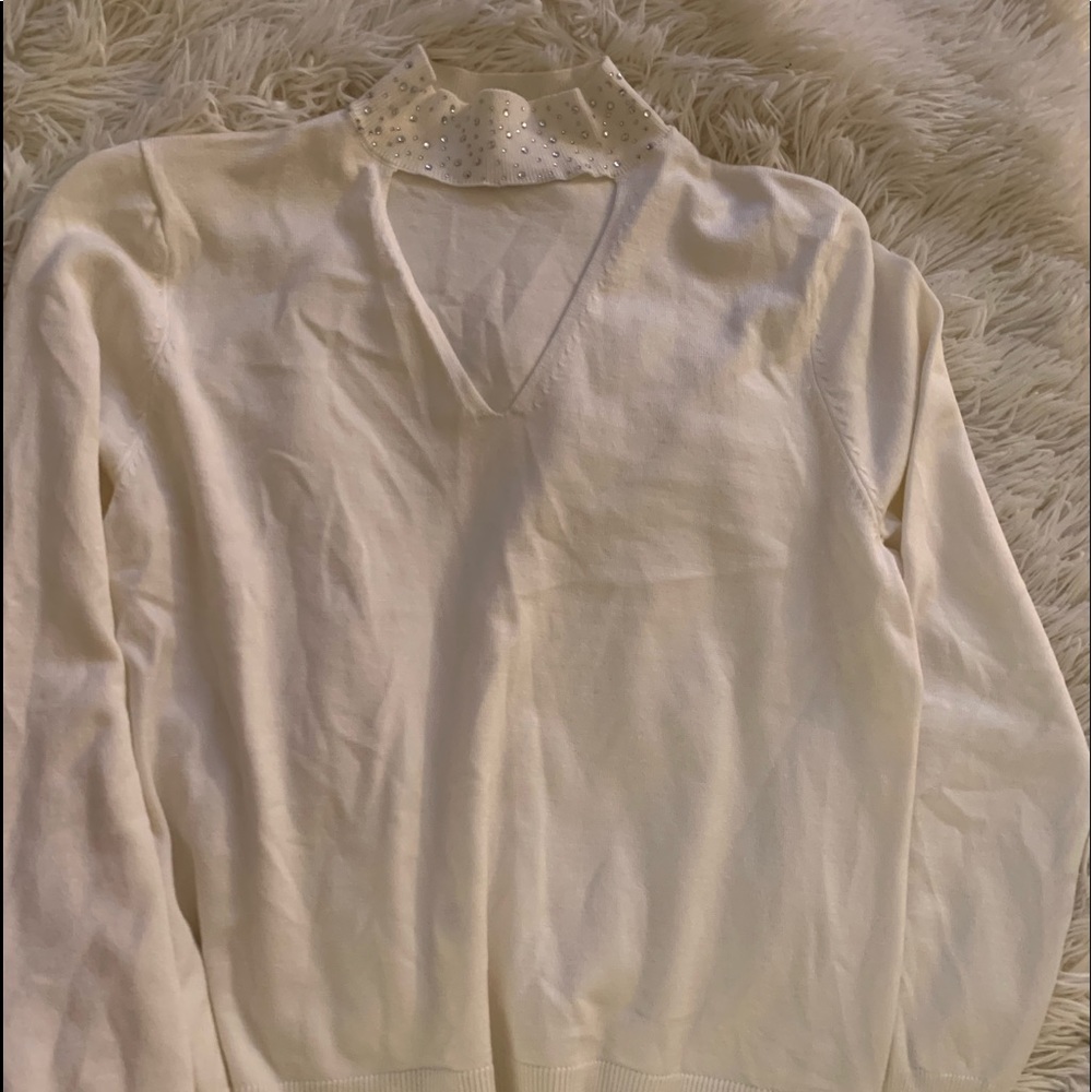 Beautiful cream sweater with rhinestones near neckline